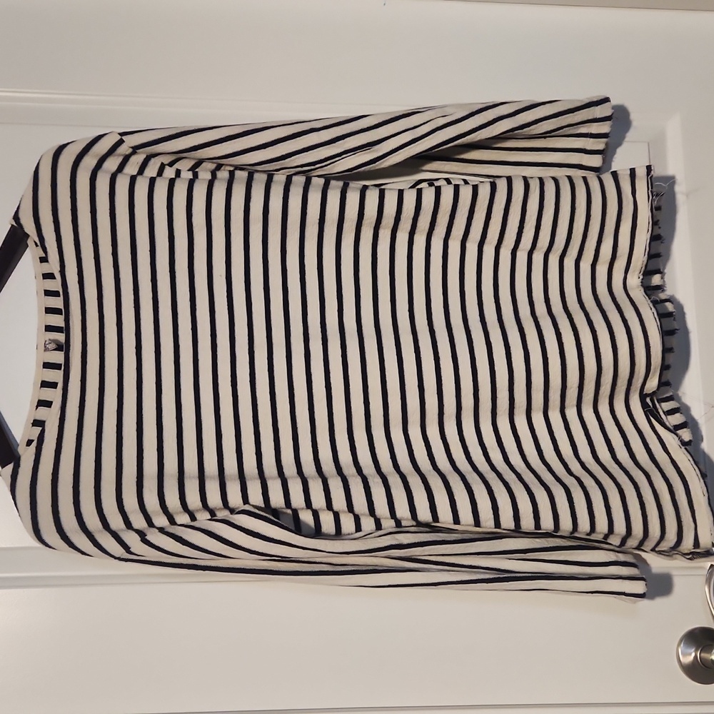 Free People.  black and white (cream) long sleeve with pockets